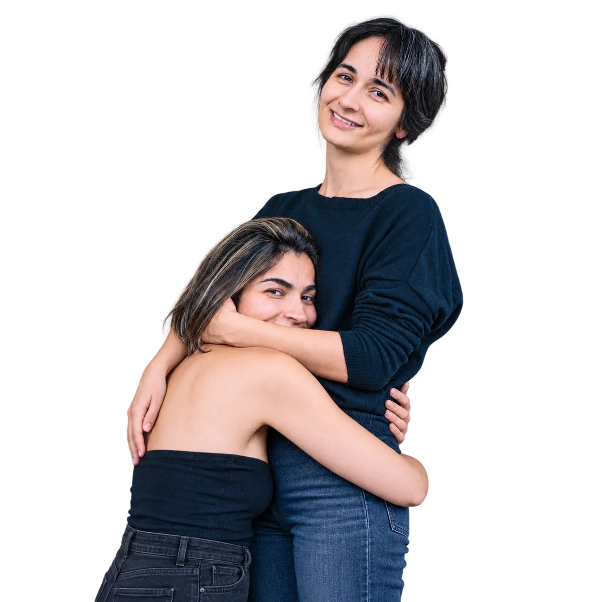 Two women embracing.